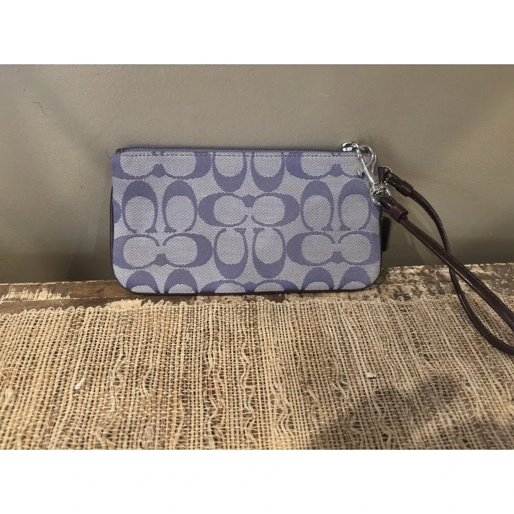 Coach Corner Zip Wristlet In Signature Canvas  Silver/Iris With Silver Detail‎